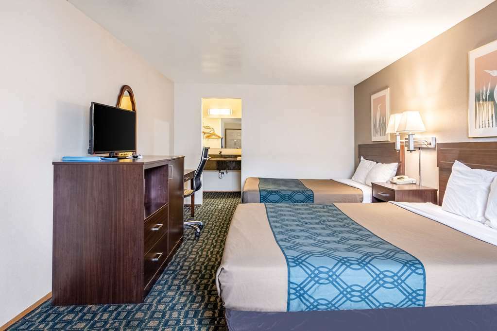 Oyo Woodland Hotel And Suites Bilik gambar